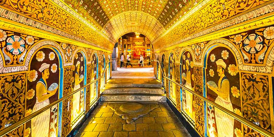An ornate corridor of The Temple of the Sacred Tooth Relic.